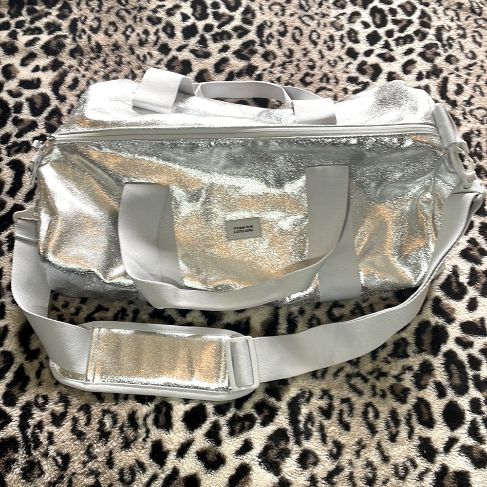 Chipotle Silver Sparkle Round Duffle Bag - 19” x 10”